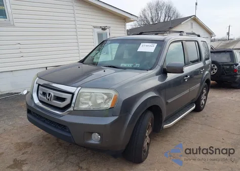 2011 Honda Pilot Touring z USA, uszkodzony, nr VIN 5FNYF3H98BB021222